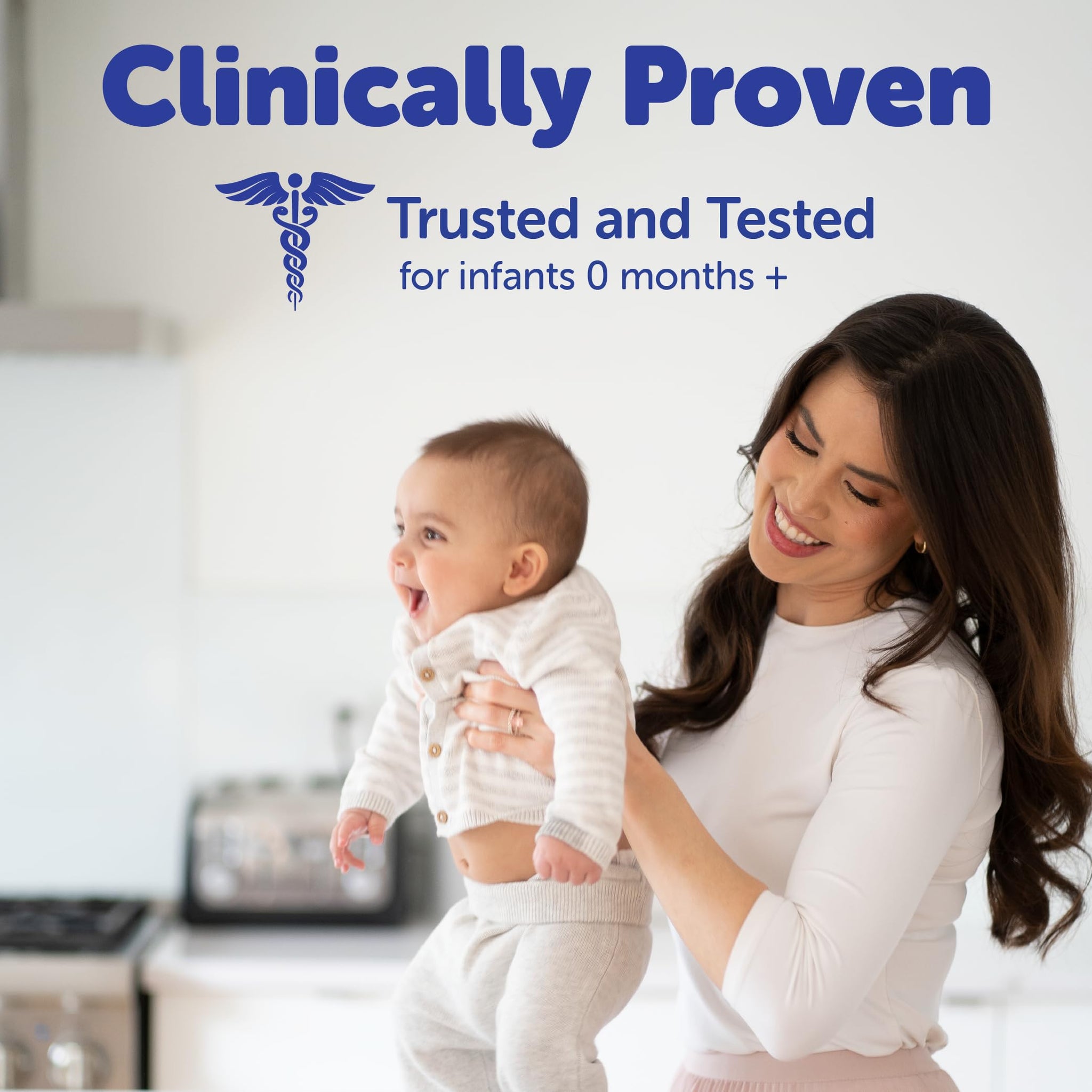 Happy mother holding her baby, showcasing clinically proven vitamin D drops for infants 0 months and older.
