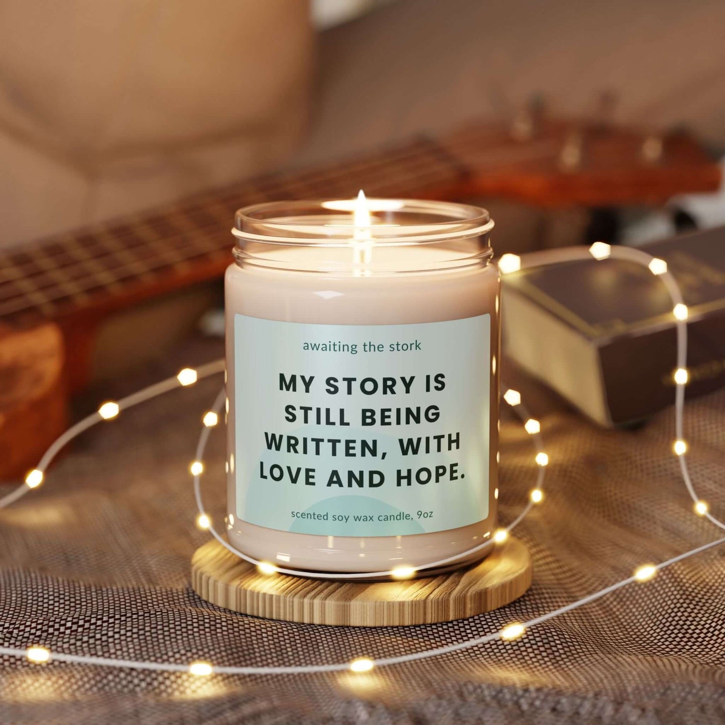 Empowering soy candle with message 'My story is still being written, with love and hope', symbolizing hope in pregnancy and postpartum.