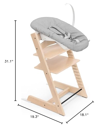 Stokke Tripp Trapp baby high chair with Newborn Set showcasing adjustable design and dimensions.