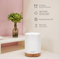 Essential oil diffuser by ASAKUKI with auto shut off, timers, and mist options for TTC support in a calming space.