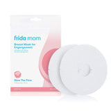 Frida Mom breast mask for engorgement with reusable breast pads, featuring cabbage, jasmine, and sage for soothing relief.