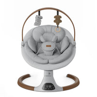 Stylish baby swing for infants with plush seat and hanging toys, perfect for calm, hands-free moments for new moms.