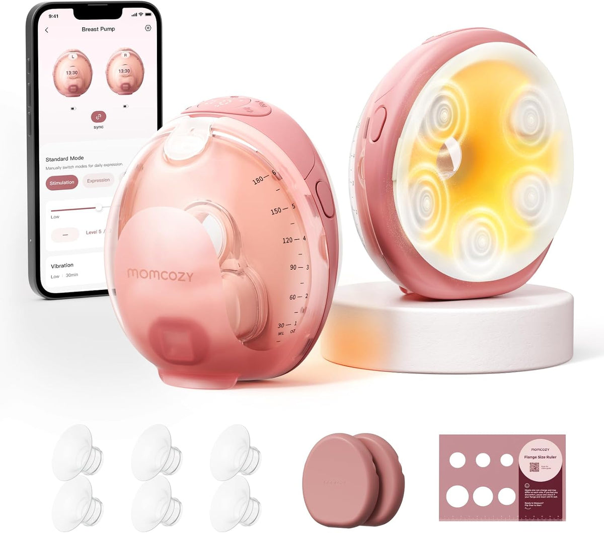 Momcozy Wellness 1 two-pack: two rose-pink wearable breast pumps, one showing the 180ml collector scale and one showing the heated flange and five massage nodes, with the app paired to left and right pumps, six flange inserts, two caps and a flange size ruler.