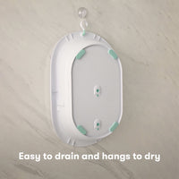 Baby bathtub design with easy drain and hanging feature for convenient drying.