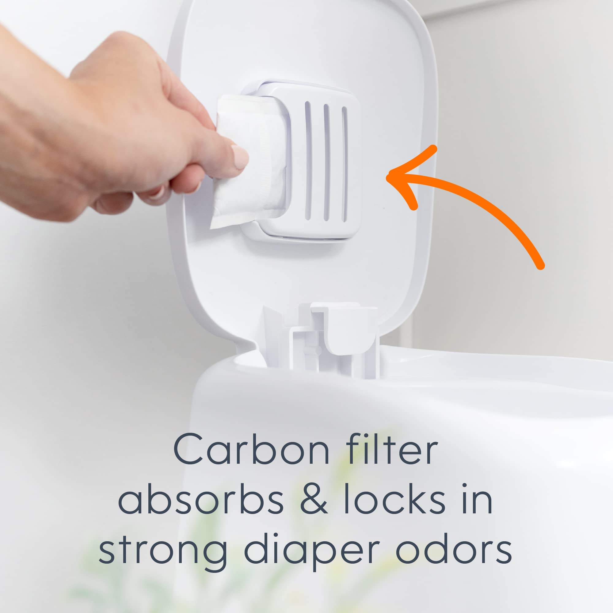 Carbon filter feature of the diaper pail absorbs and locks in strong diaper odors for effective odor control.