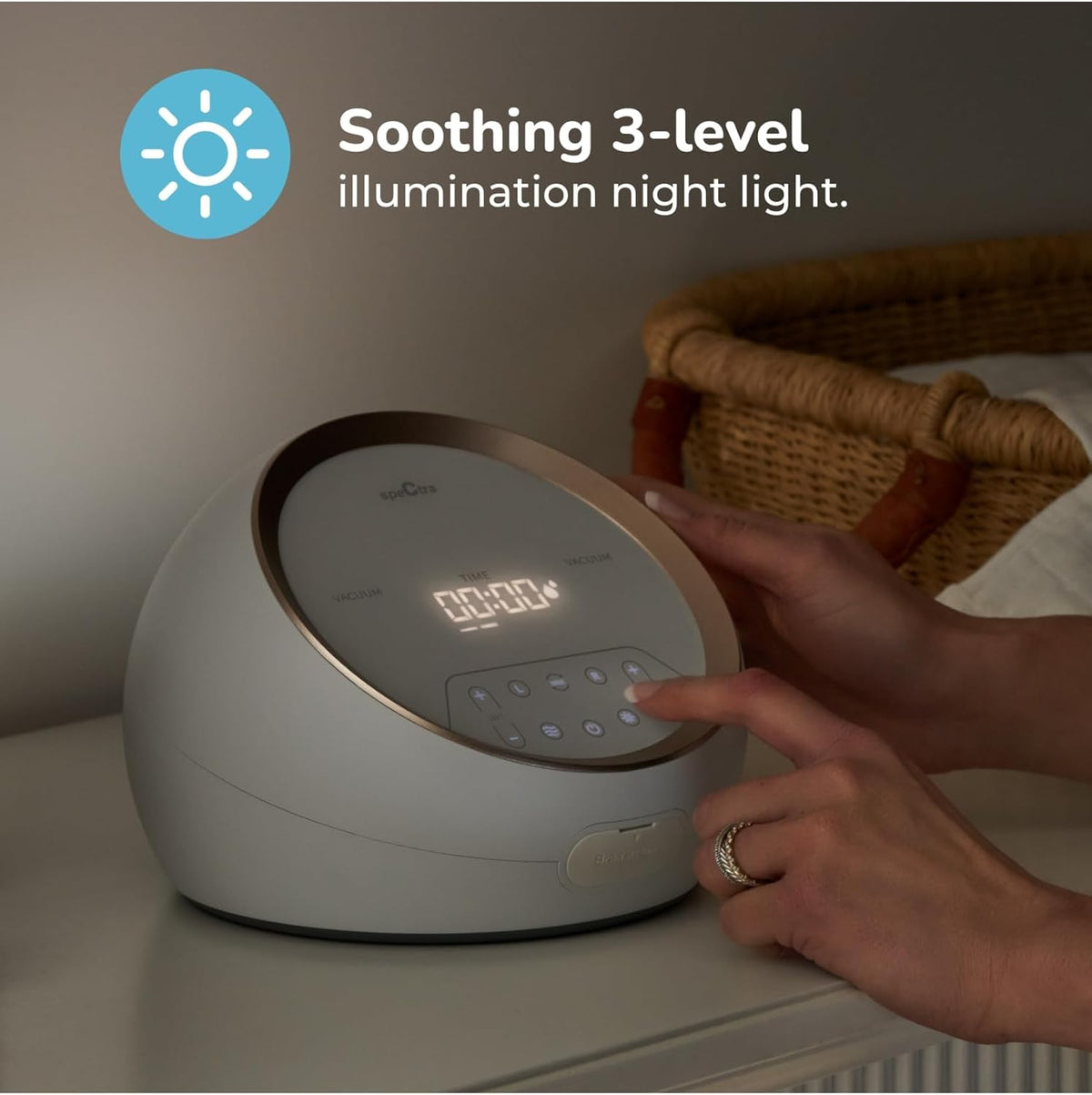 Hand adjusting the Spectra Synergy Gold at night with its 3-level night light on