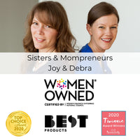 Sisters and mompreneurs Joy and Debra, certified Women Owned, showcasing awards and achievements for their business.