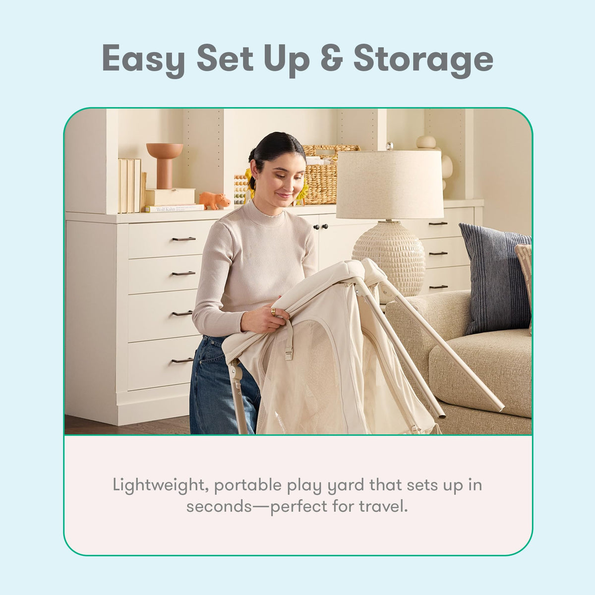 Woman folding the Newton Compact travel crib for storage