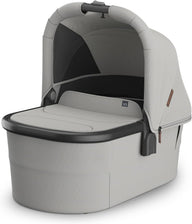 UPPAbaby Bassinet V3 in Savannah pearl grey jacquard with the canopy extended, shown from the side