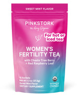 Pink Stork Organic Fertility Tea for women in sweet mint flavor, supports hormone balance and reproductive wellness.