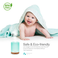 Essential oil diffuser positioned next to a child wrapped in a towel, promoting a safe and eco-friendly atmosphere.