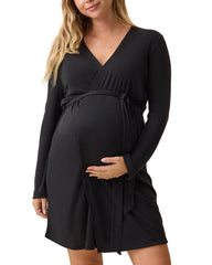 Pregnant woman in a black ribbed maternity nursing robe tied above the bump, hand in the side seam pocket