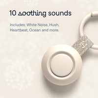 Close-up of the Hatch Go Portable Sound Machine for baby showing 10 soothing sounds like white noise and heartbeat.