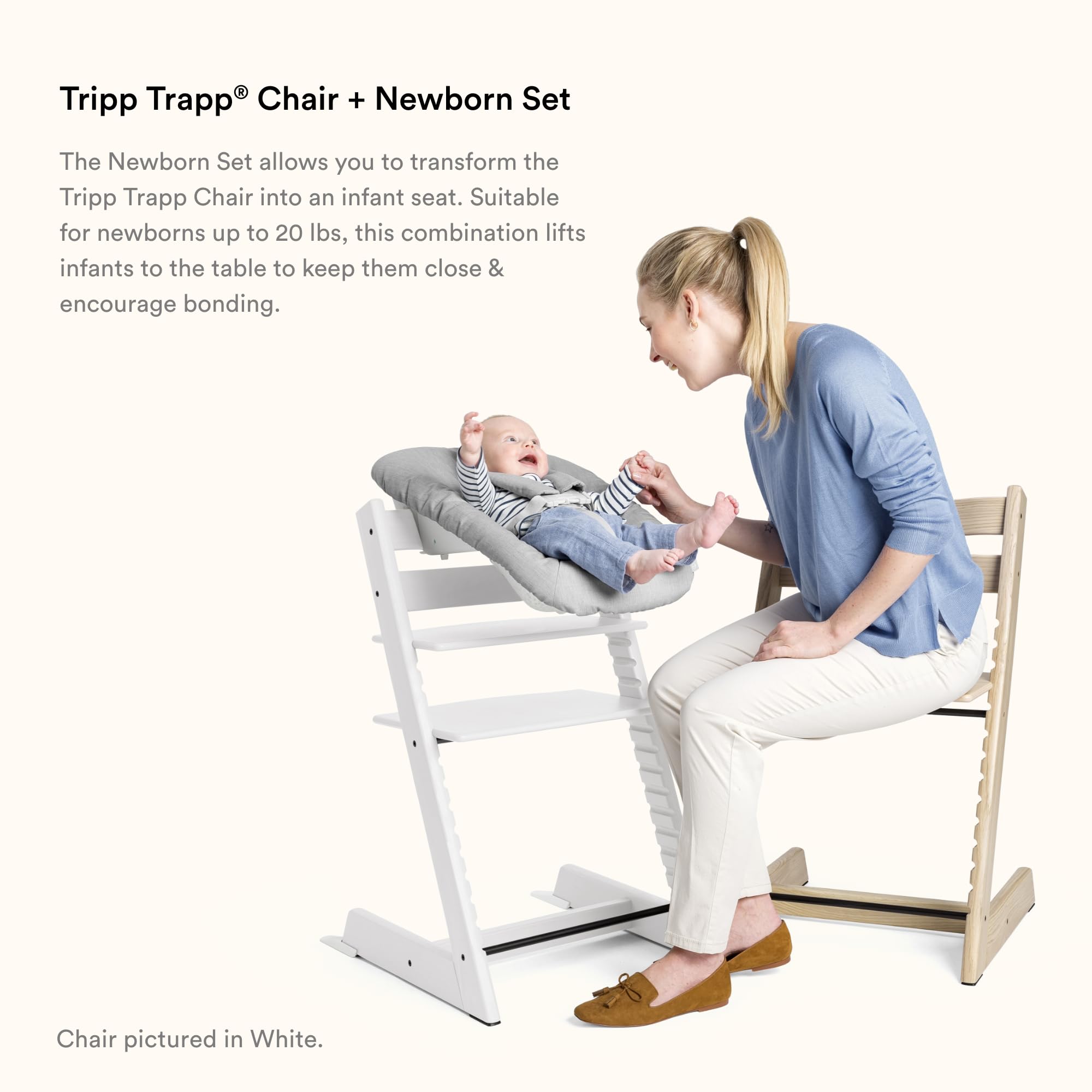 Stokke Tripp Trapp baby high chair with newborn set, designed for bonding and comfort, suitable for infants up to 20 lbs.