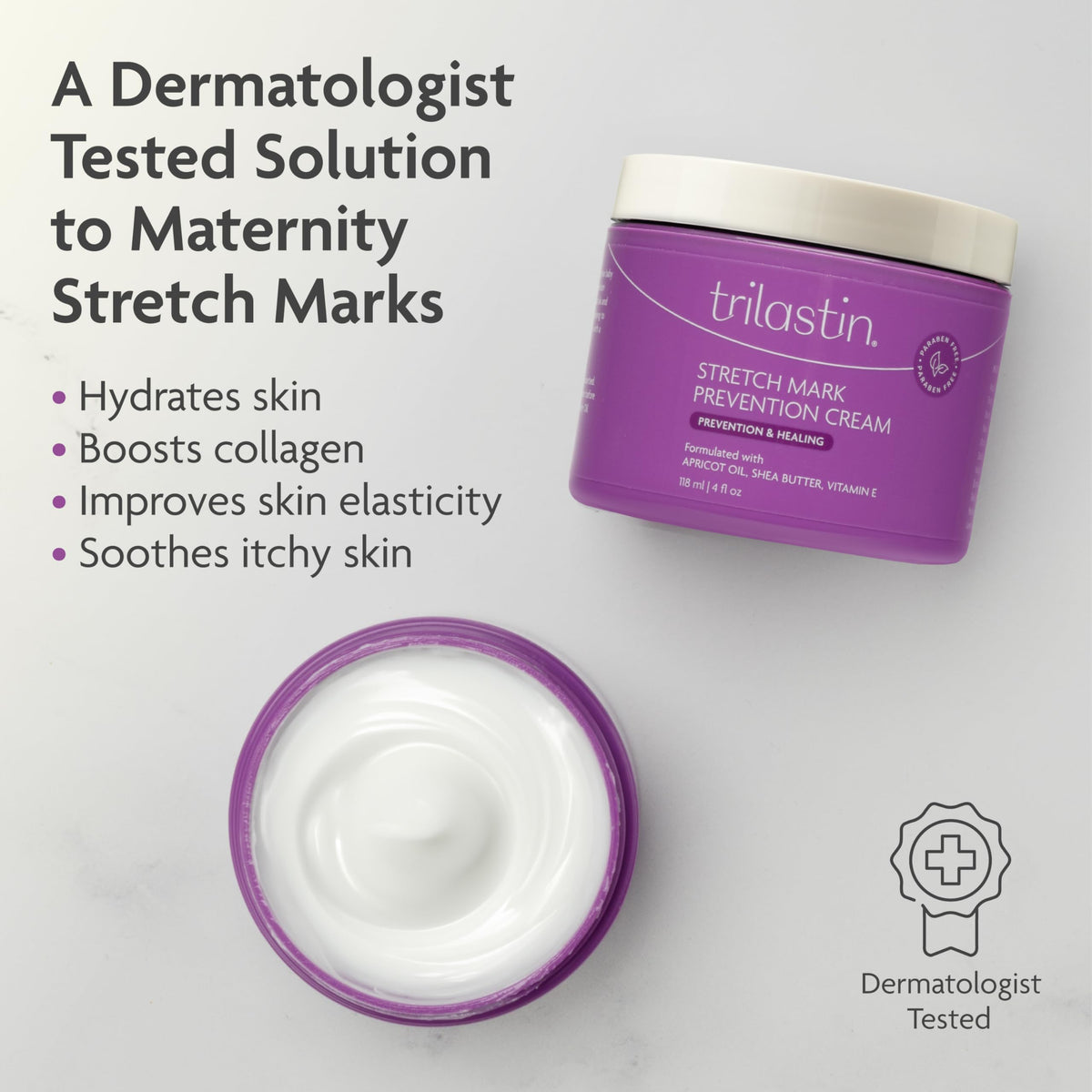 Open jar of TriLASTIN maternity belly cream showing its thick white texture, marked dermatologist tested