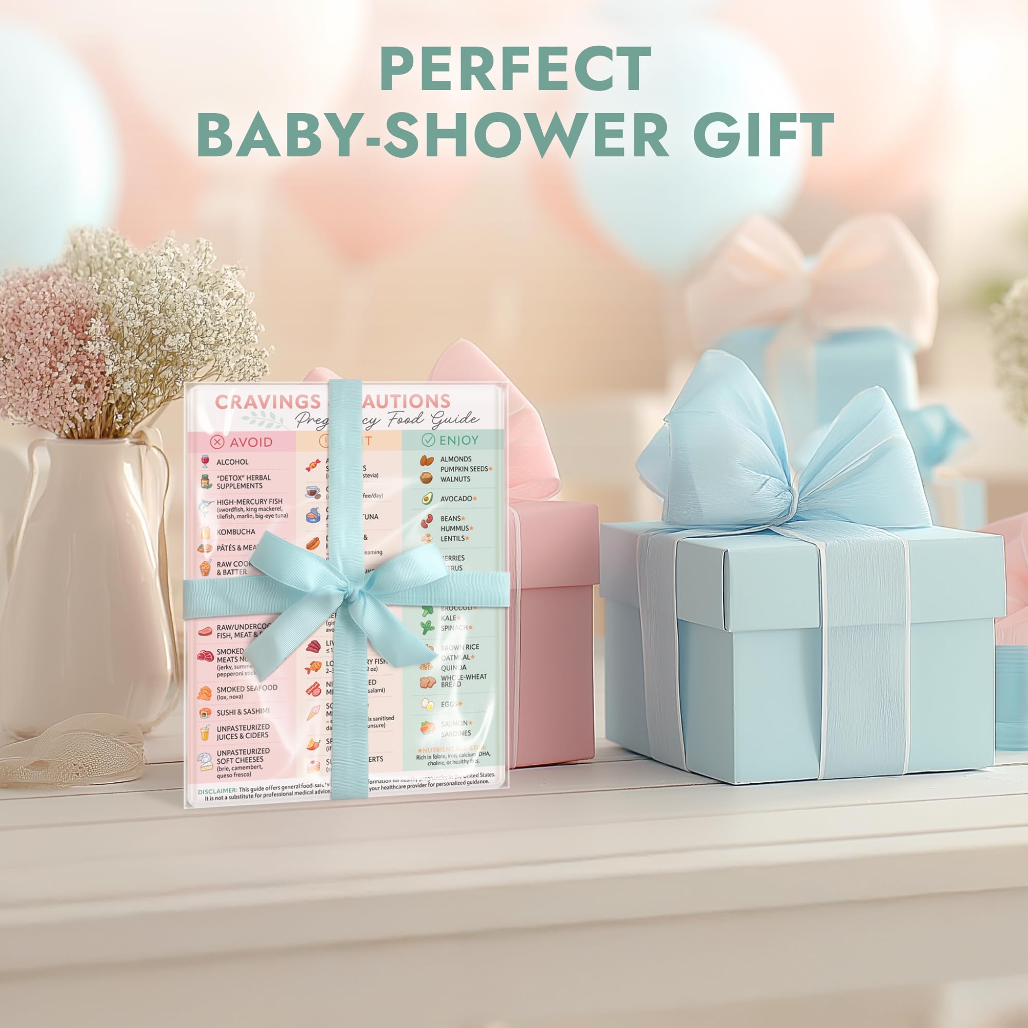 Pregnancy food guide magnet displayed among pastel baby shower gifts with text that says 'Perfect Baby-Shower Gift'.