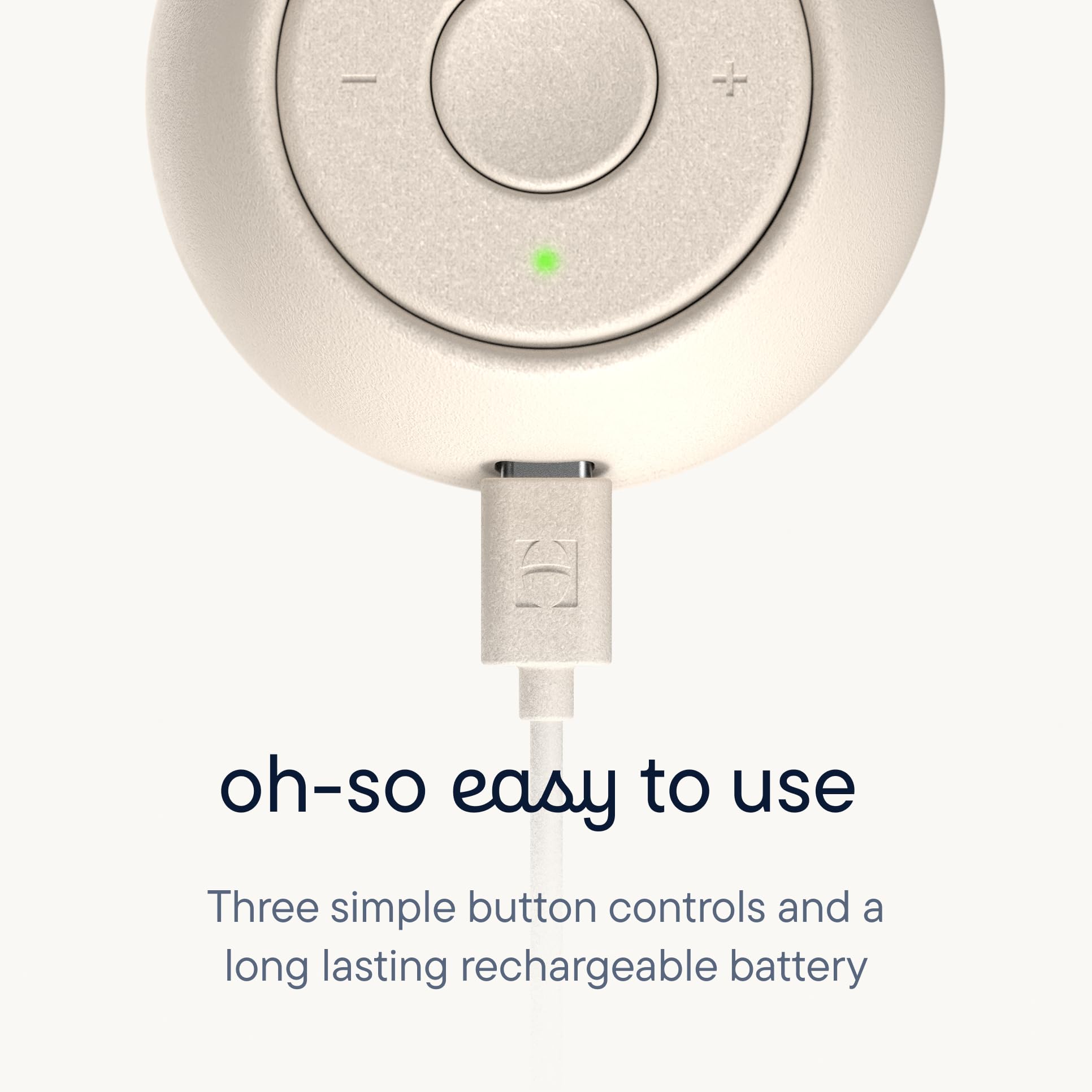 Close-up of the Hatch Go Portable Sound Machine for baby, showcasing three button controls and a charging port.