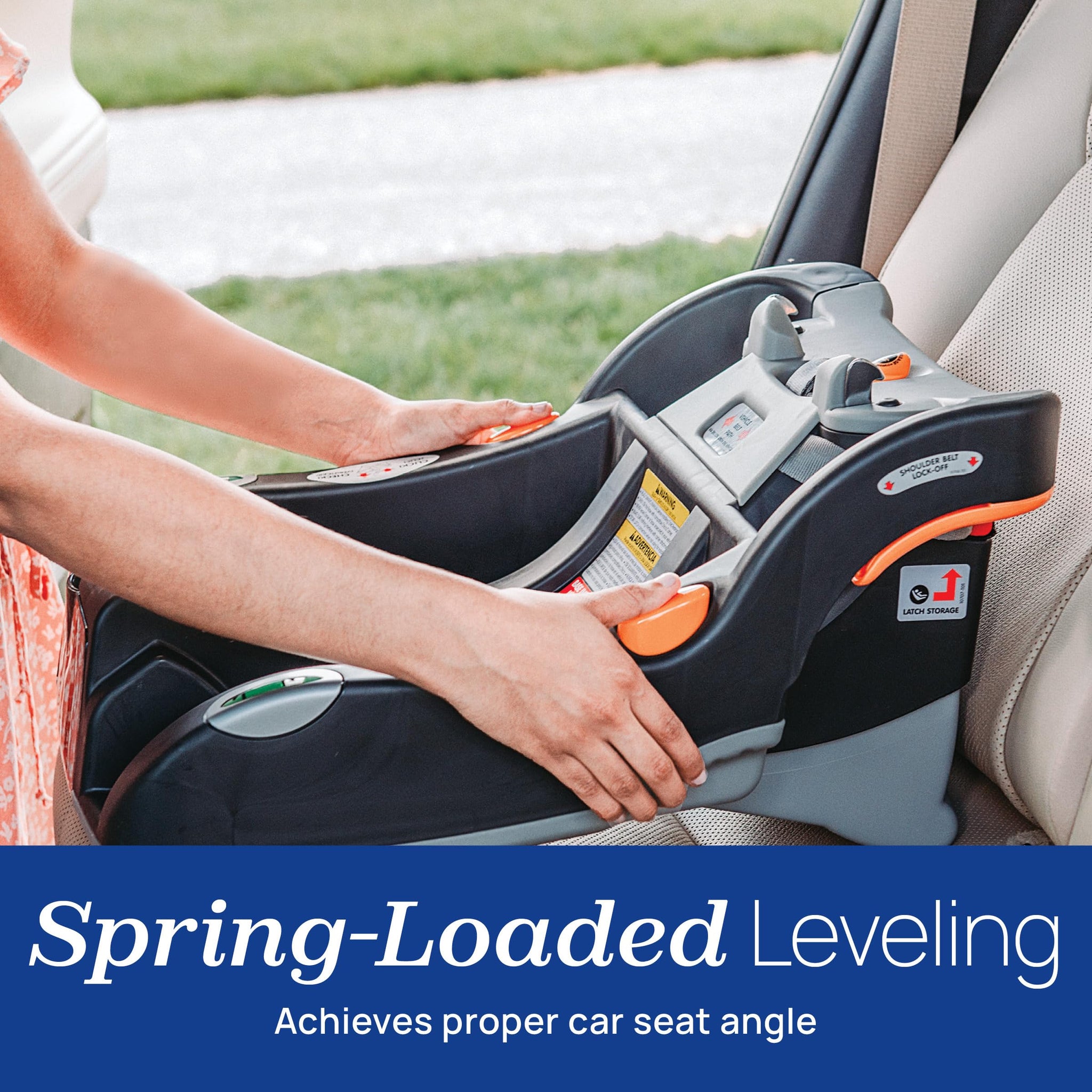 Infant car seat showing spring-loaded leveling feature for proper car seat angle.