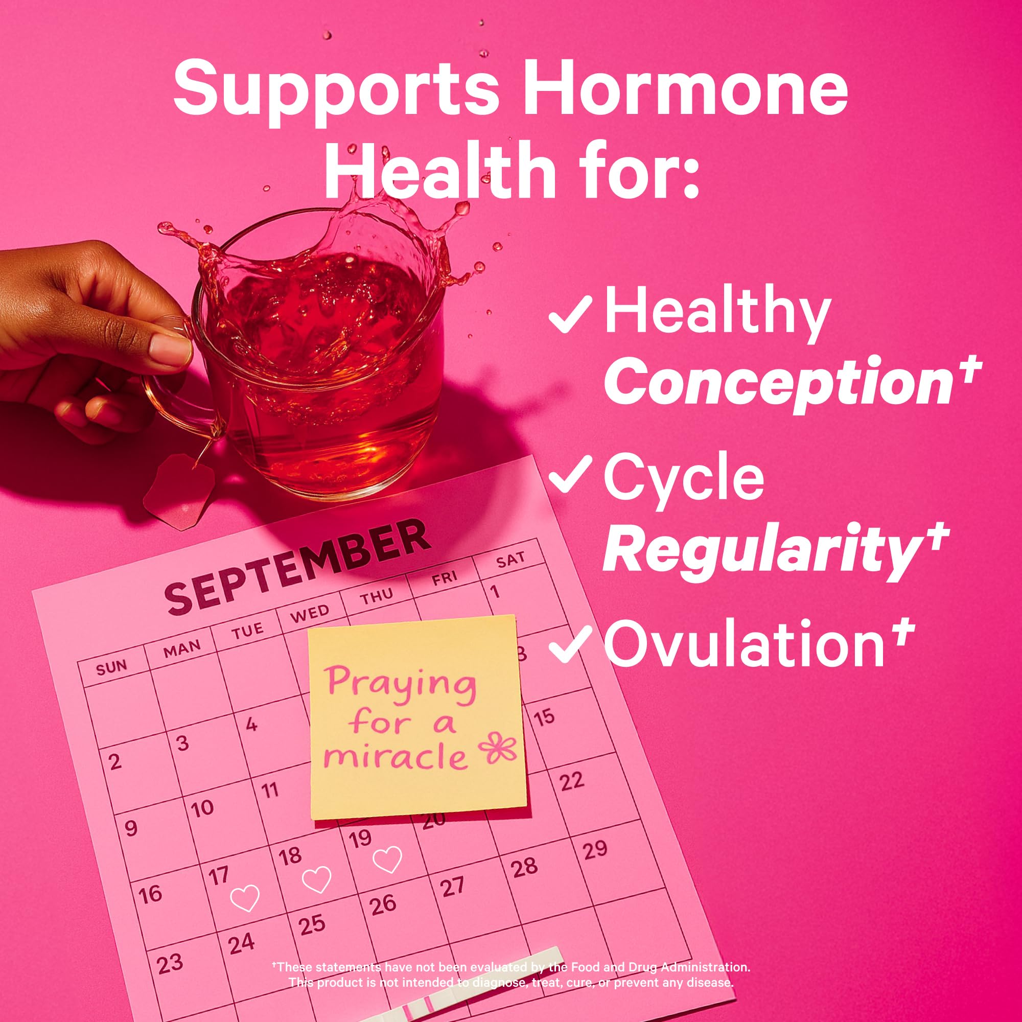 Fertility tea for women supporting hormone health for conception, cycle regularity, and ovulation with a pink background.