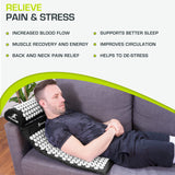 Man relaxing on an acupressure mat and pillow, highlighting benefits like pain relief, better sleep, and improved circulation.