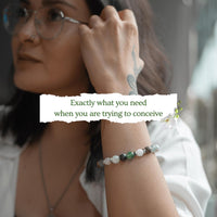 Fertility crystal bracelet worn on wrist, promoting energy and support during the trying to conceive journey.