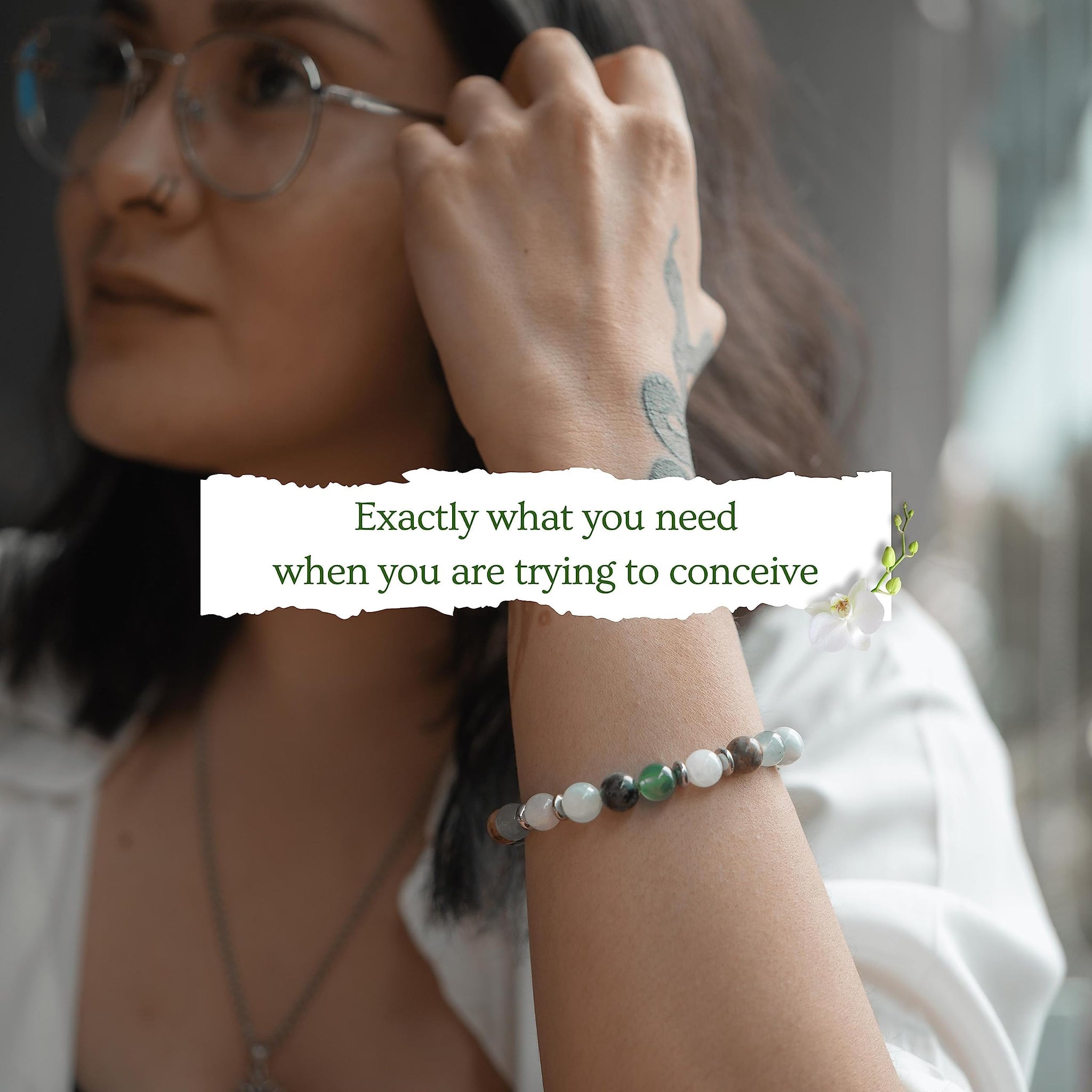 Fertility crystal bracelet worn on wrist, promoting energy and support during the trying to conceive journey.