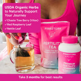 Fertility tea for women from Pink Stork displayed with organic herbs for hormone balance and reproductive wellness.