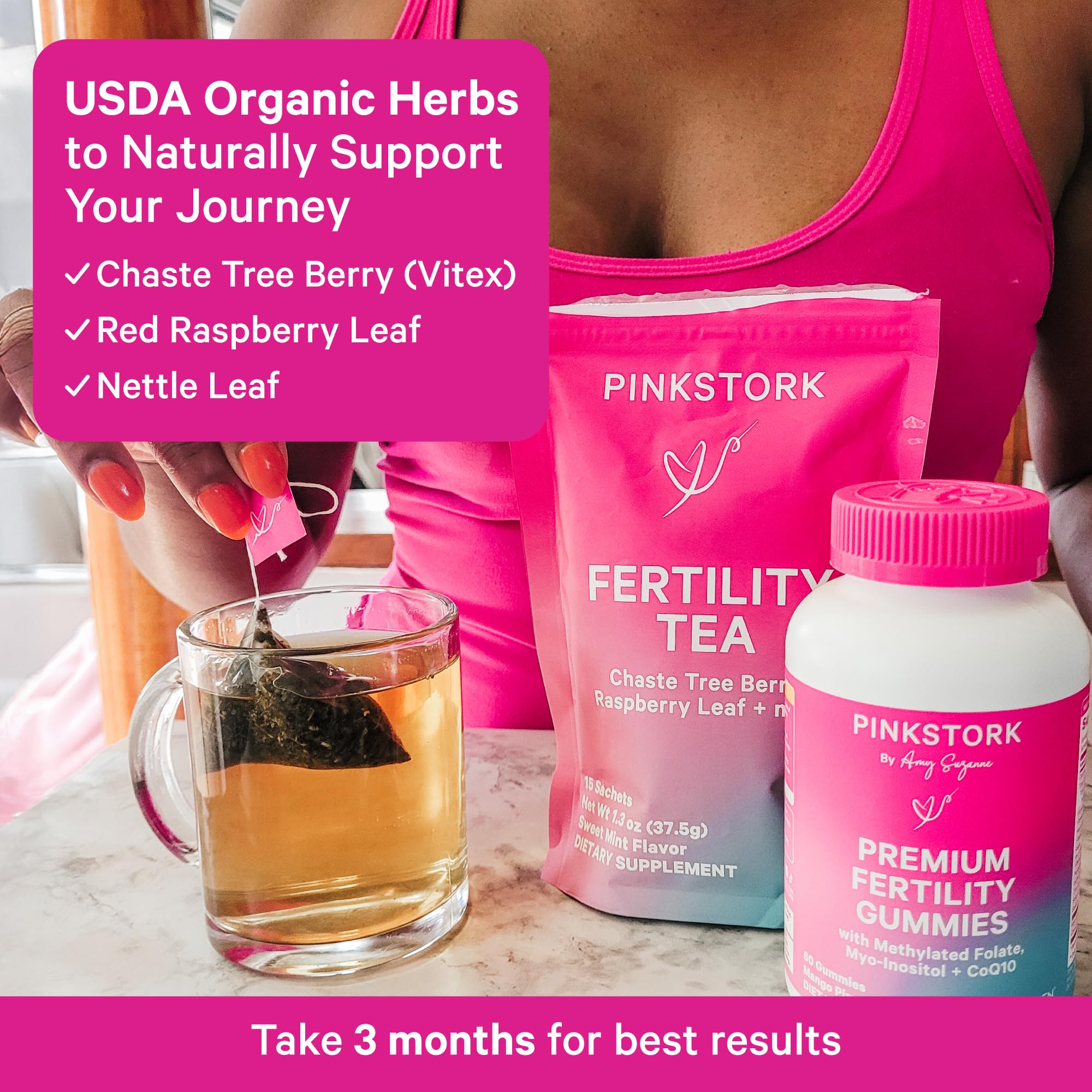 Fertility tea for women from Pink Stork displayed with organic herbs for hormone balance and reproductive wellness.