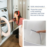 A woman loading a washing machine with a crib mattress cover, showcasing the 100% washable feature of the HALO DreamWeave crib mattress.